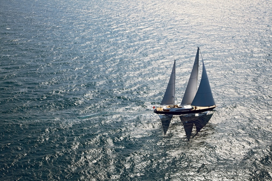 Looking at a large sailing yacht on the water, we can assume it's a Perini Navi.
