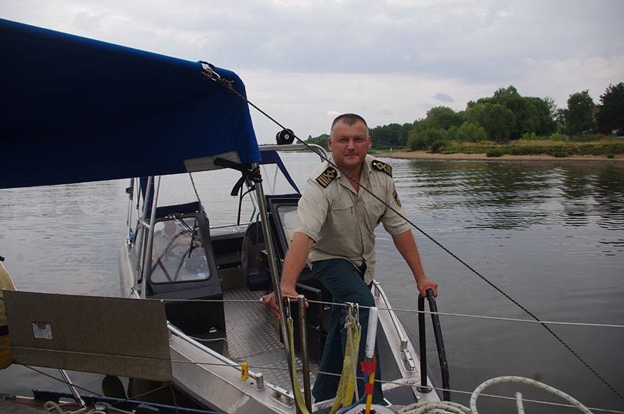 Alexander Lapin, the senior group of Yaroslavl State Migration Service on a service boat.