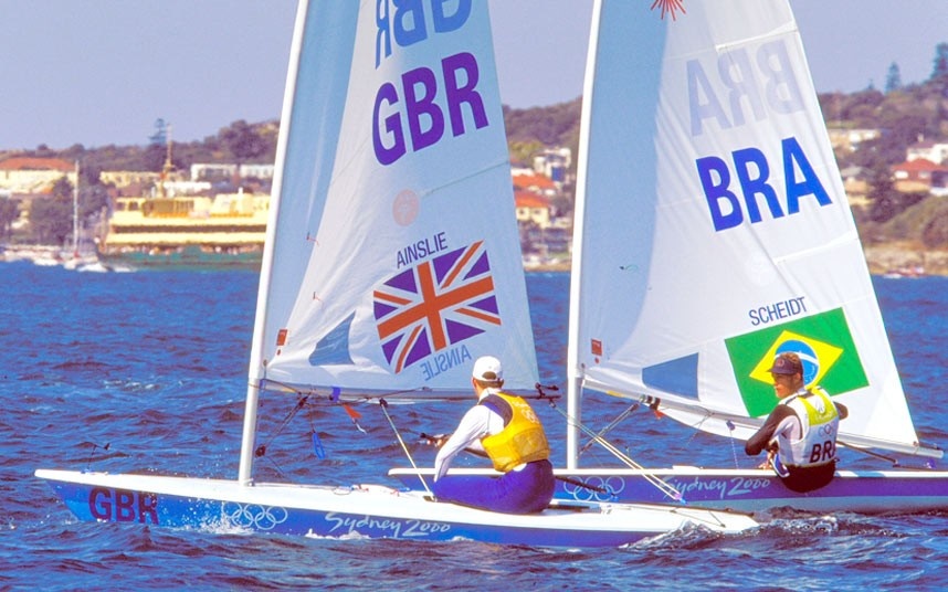 Ben Ainslie (left) fights for Olympic gold in Laser class with Brazil's Robert Schidt.