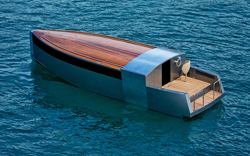 Boats are stored in a garage decorated with mahogany and mirrors.