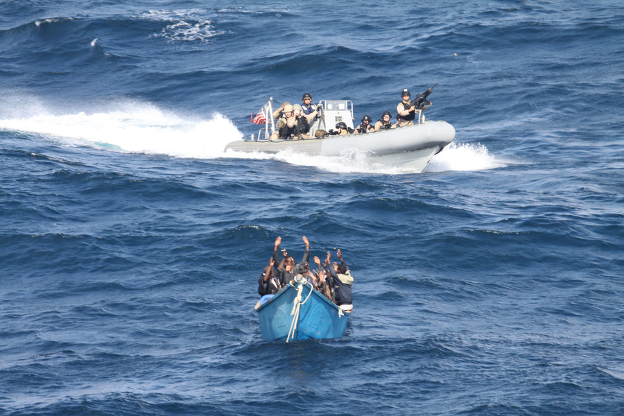 A hijacking team from the USS Pinckney is approaching a boat suspected of pirate attacking a Nordic Apollo. Gulf of Aden, December 2011. Photo by Wikimedia Commons