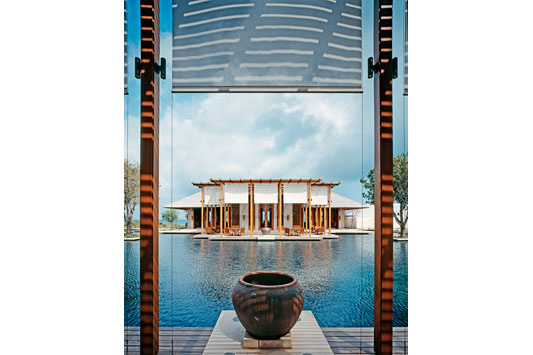 The view of the restaurant from the library clearly demonstrates the symmetry of Amanyara architecture.