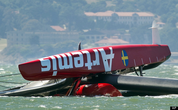 Overturned catamaran Artemis Racing
