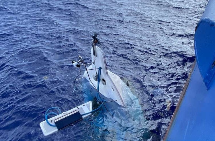 A yachtsman sat on the bow of his half-sunk yacht for more than 24 hours