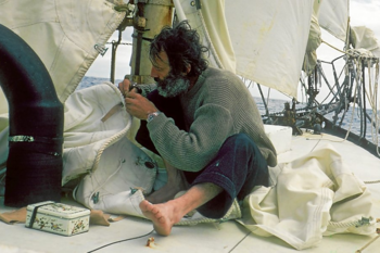 People and boats: Bernard Moisture and Joshua.