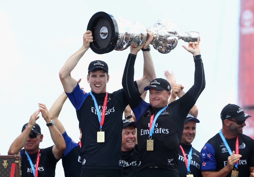 Peter Burling (left) and Glenn Ashby with the America's Cup main trophy.
