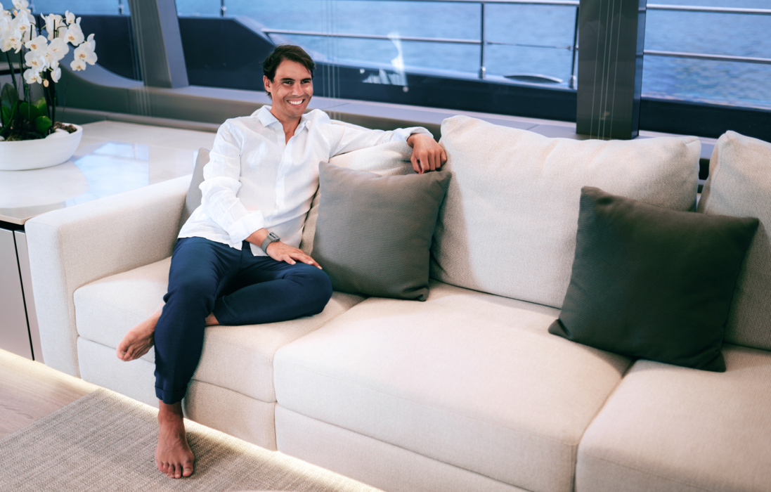 A calm and light modern interior with no exquisite white and grey hues, perhaps the interior decoration of the world's first racket yacht can be described.  