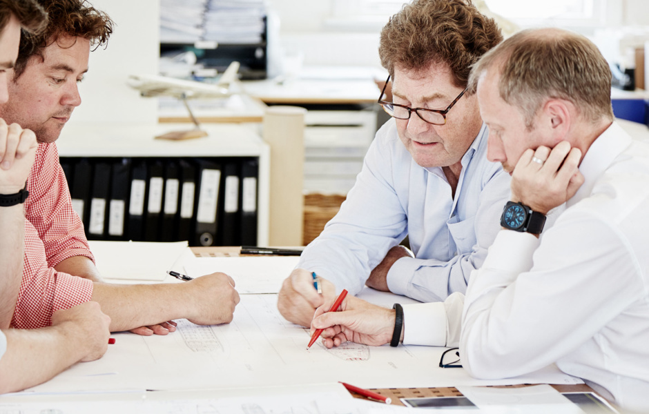 Andrew Winch (wearing glasses) and his design team.  Photo: Oceanindependence.com