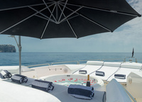 There's a Jacuzzi on the main deck bow, surrounded by sun loungers. You can hide from the rays by opening the beach umbrella on the barbell.