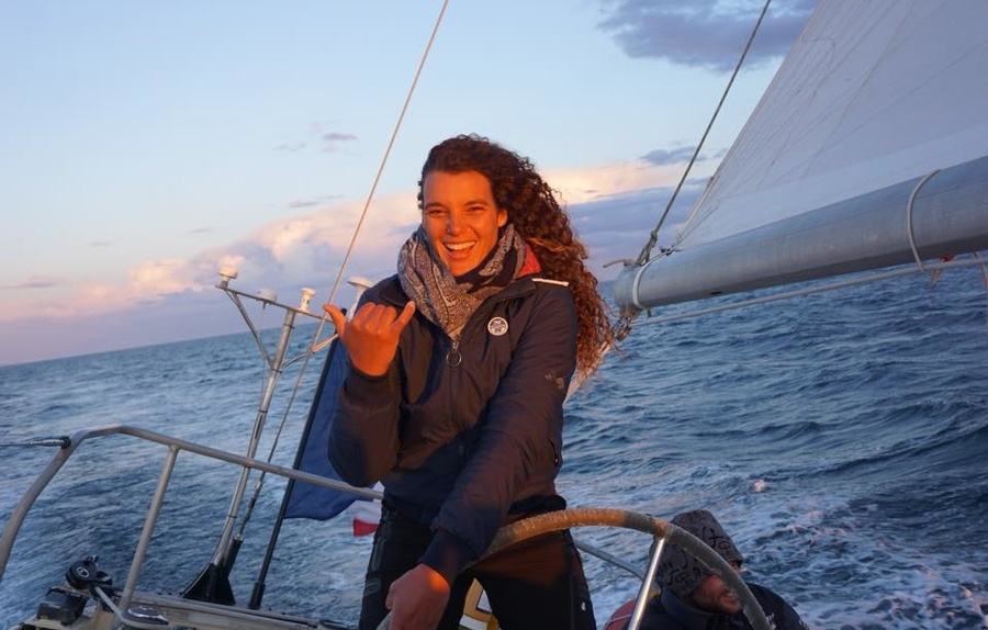 Marie Tabarley at the helm of the Pen Duick VI.