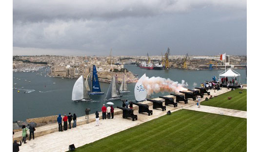 The start of the race in the port of Malta. Esimit Europe is well visible with its blue Gasprom sail.