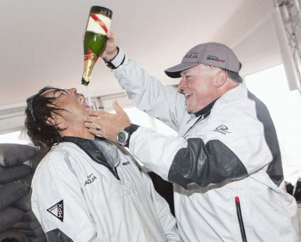 The winners know how to drink champagne. Chris Bake and Christian Camp, Team Aqua.