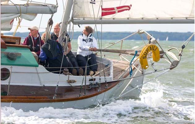 "Swahili" during the Humble Classics. Knox-Johnston's daughter Sarah on the wheel. A yachtsman has never allowed anyone to borrow a Swahili and very rarely allows anyone else to be her helmsman.