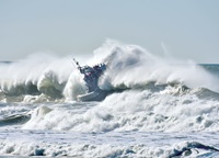 Although Dave Rogers is primarily a wildlife photographer, the Coast Guard ships fiercely fighting the waves came out in his performance truly delightful. It's breathtaking to see pictures of 47-foot boats - with at least four crew members on each - scrambling up at almost limitless angles!