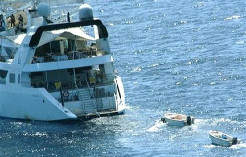 Armed pirates on the upper deck of the Ponant yacht. The yacht was captured by pirates off the coast of Somalia in April 2008. REUTERS/French Defence Ministry/Handout