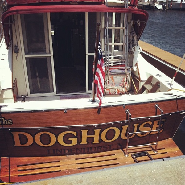 Why buy a boat? To ride a dog! Photo by eddiekmmerling