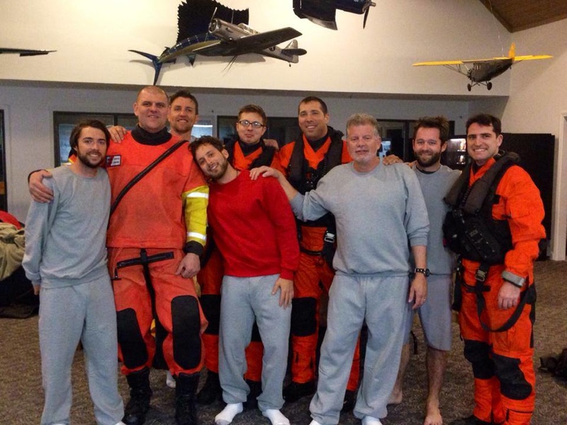 Rainmaker crew with coast guard rescuers after successful landings