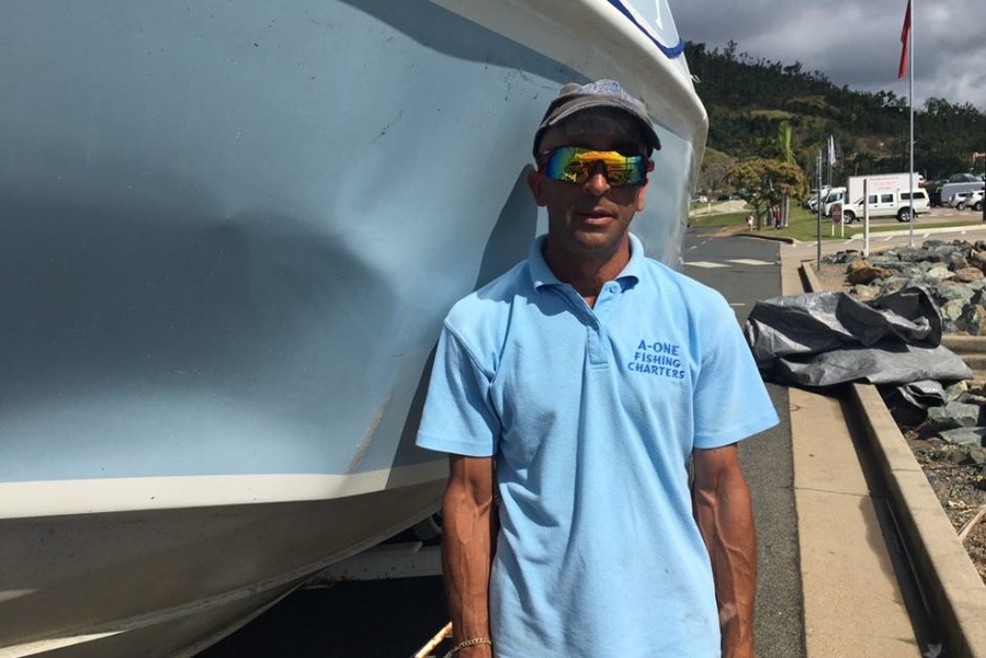 Skipper Oliver Galea near the damaged boat.