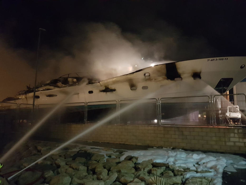 Burning boat in Alicante, Spain
