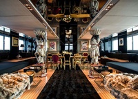 The designers of Lazzarini Pickering Architetti gave up for Dolce & Gabbana fathers. An ordinary chair is not an armchair, but a royal throne covered with gold. Statues of black natives with large jugs on their shoulders propped up the ceiling. In the materials of decoration - mink, doodle, crocodile and eel leather. 