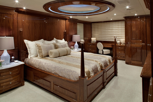 The owner's stateroom with traditional windows on both sides is located forward on the main deck.