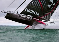 «This photo is one of those I took for The Guardian about Alex Thomson and his stunning new IMOCA 60 Hugo Boss. The yacht was on the water for 10 days and Alex and his crew were still testing what she could do. The 18-20 knots breeze was at that time the strongest wind the boat had ever encountered. The team took the reefs, the boat is going under the staysail number 3, but still speeds up over 30 knots. It's a real rocket. The photo shows the moment when Hugo Boss went as far above the water in the foyles as possible. A little higher and it will fall back into the water»,