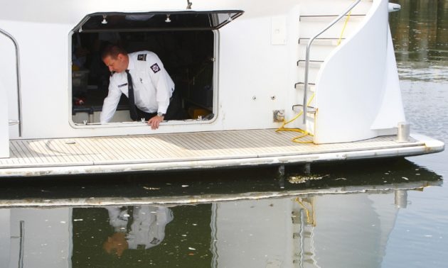 Customs inspects the yacht.