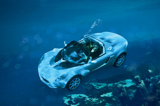 Under water the Rinspeed sQuba is driven by two electric water jets, on water by two electrically driven screws, on land also by electric traction.