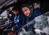 Frenchman Thomas Traversa is warming up in his car while waiting for his turn.