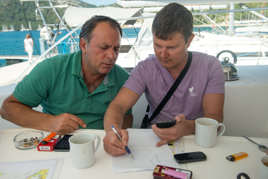 Issa Kalaigi (left) and Alexei Brunov at the captain's briefing.