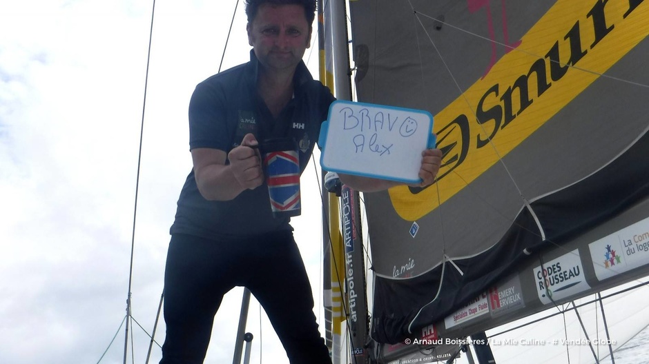 Arnaud Boissières congratulates Alex Thomson on crossing the equator.