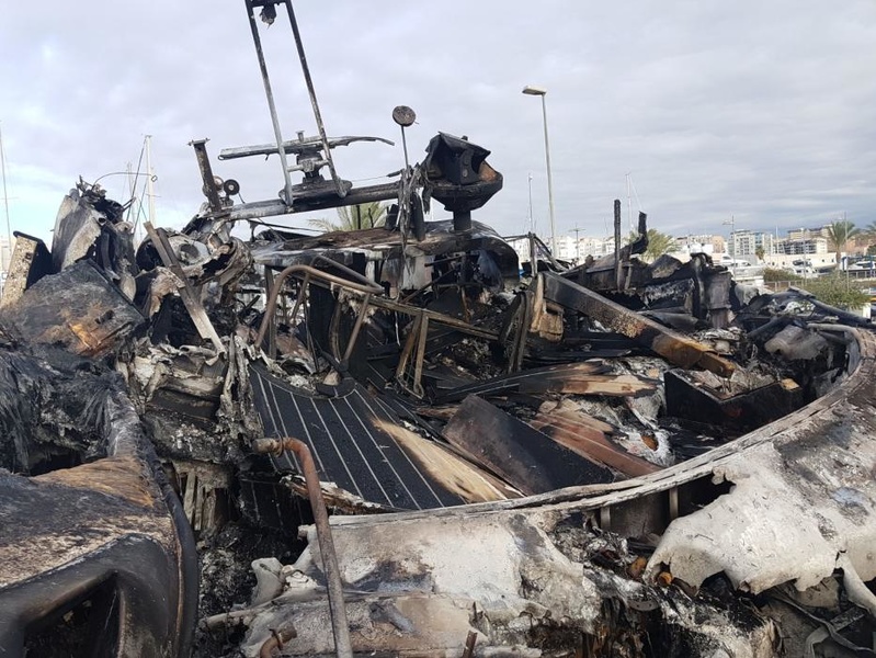 Burned boat in Alicante, Spain.