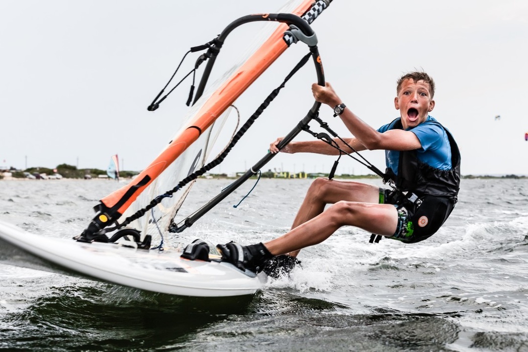 «This picture was taken during the preparatory days before FanagoriaCup 2014. The young windsurfers were training, they were sincere and not worried about the competition. The photos of the athletes were taken in shallow water. Their tangible efforts, a very strong wind and the choice of a non-standard point for shooting allowed us to get this emotional shot», - says the author of the photo.