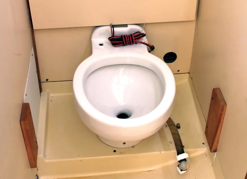 Dry the latrine before working with the electrical wiring and piping.