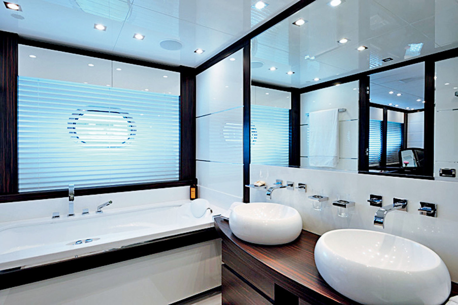 The owner's bathroom contains a real bathtub and two washbasins.