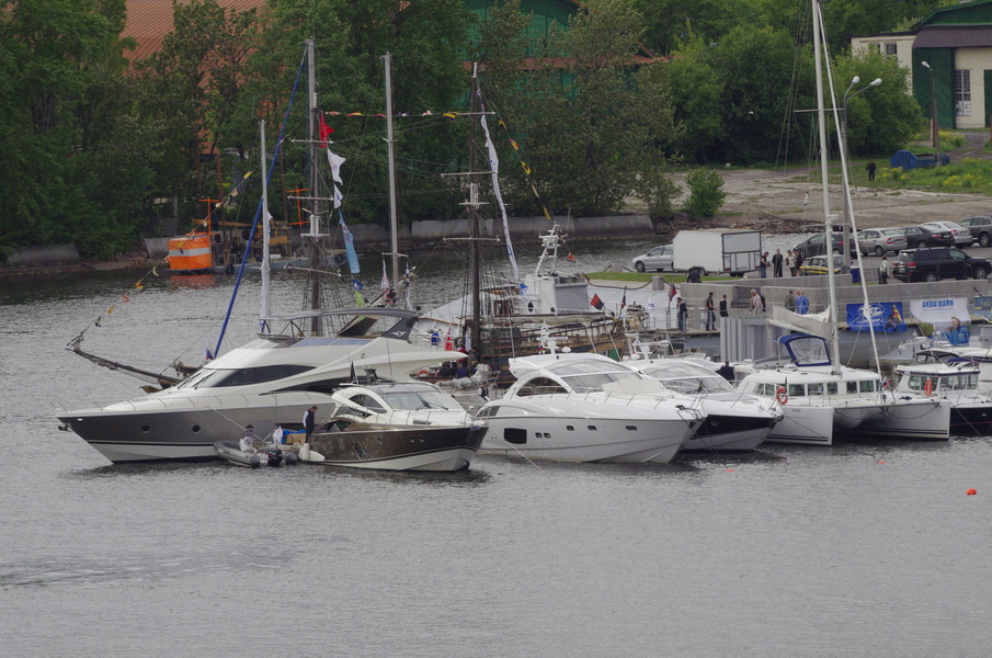 Catamaran Lagoon (right) - another large sailing yacht of the exhibition