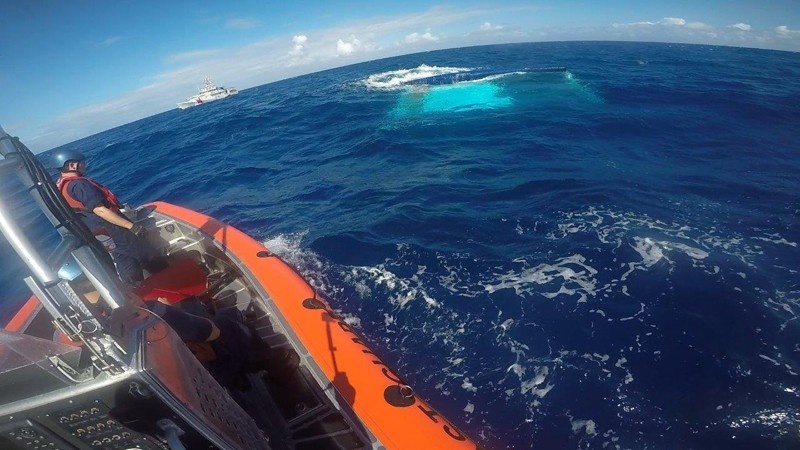 Rescuers are approaching the Surf the Summer catamaran.