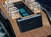 Another thing to keep quiet about is the transom hatch flush with the bathing platform. The teak hatch cover opens first, and only then the aft gate rises.