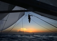 «Buck's Tim Harrold unfurls his spinnaker on the ASM Shockwave 5 off the coast of New South Wales on the first night of the 2008 Rolex Sydney Hobart Yacht Race. December 26, 2008»,